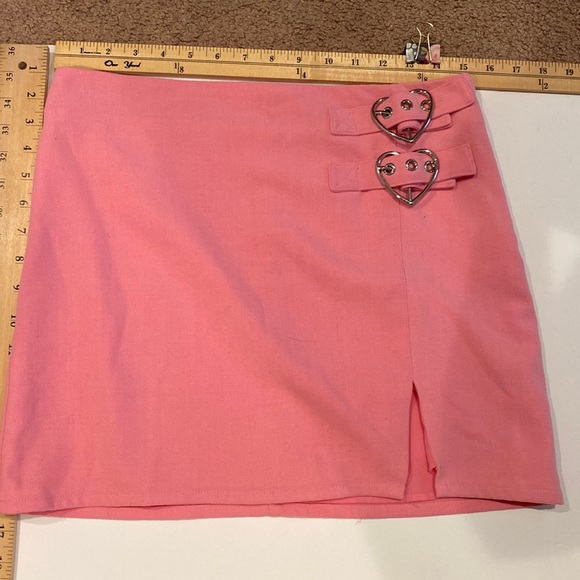 Sugar Thrillz Dresses & Skirts - Pink mini skirt with two heart buckle